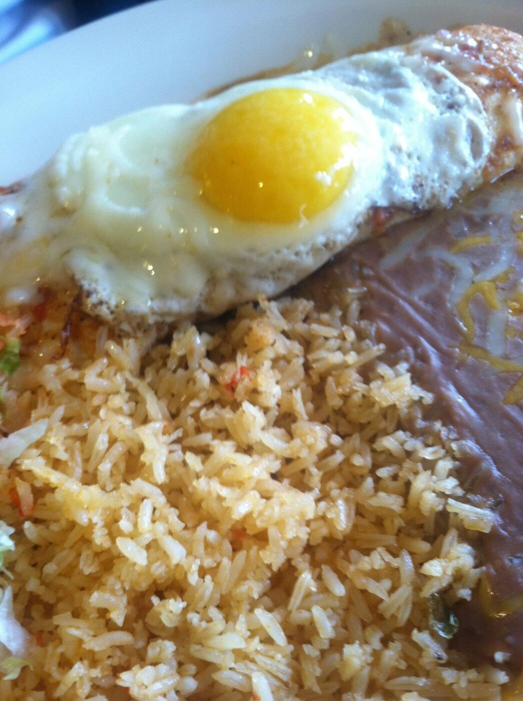 Chapala breakfast with a sunny-side egg, rice and beans