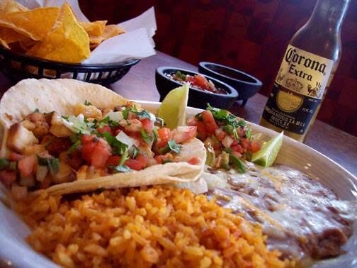 Fish tacos with pico de gallo, rice and beans