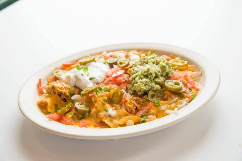 Chapala loaded nachos with guacamole, sour cream and jalapeños